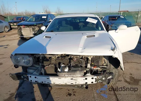 2014 Dodge Challenger Sxt z USA, uszkodzony, nr VIN 2C3CDYAGXEH176329